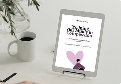 White tablet reader on a desk