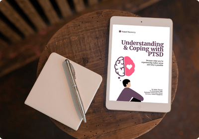 White tablet showing ebook on a desk